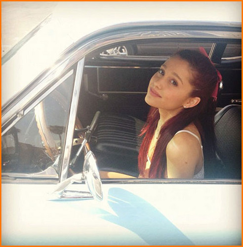  Ariana in a car