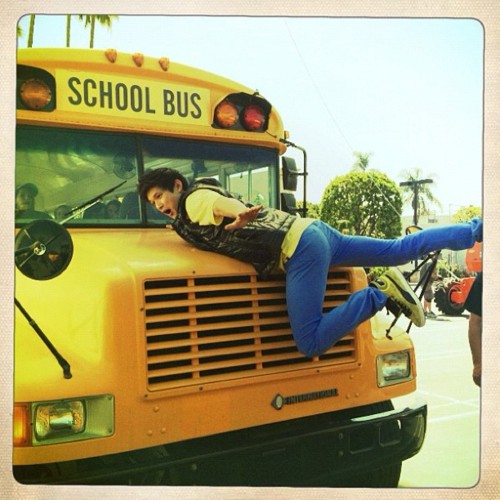 Harry on set of Glee filming props