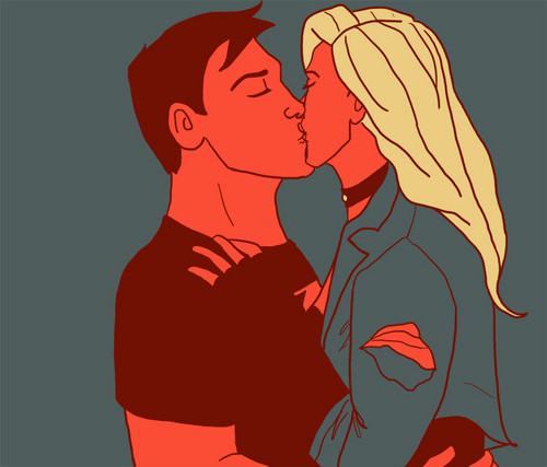  Superboy and Black Canary kiss