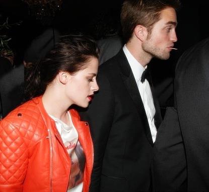  holding hands at Cosmopolis afterparty