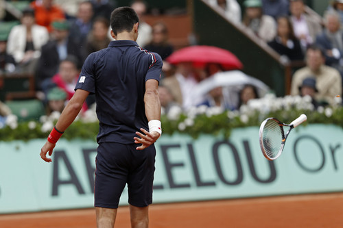 Novak Djokovic throws his racquet in anger, French Open, Roland Garros, Paris, June 10, 2012 