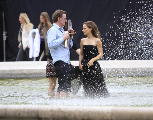  Modeling for a Miss Dior campaign фото shoot in the gardens of the Palais-Royal in Paris (June 26t