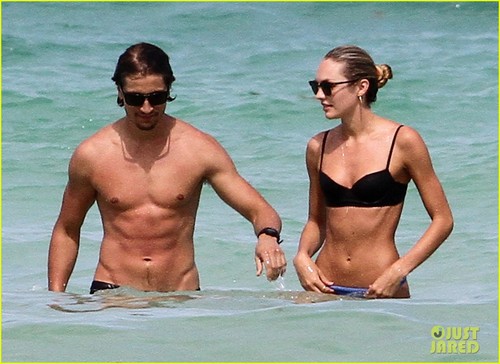 Candice Swanepoel and Hermann Nicoli at the beach