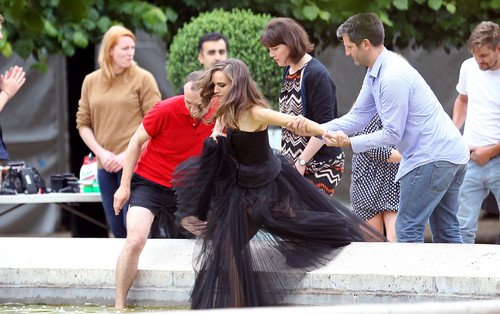  Modeling for a Miss Dior campaign foto shoot in the gardens of the Palais-Royal in Paris (June 26th