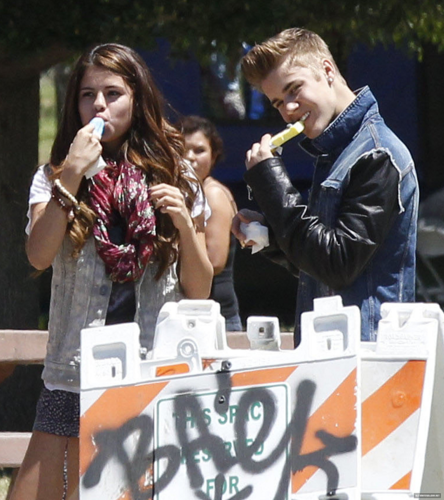  Selena - With Justin enjoying ice cream in the park - June 30, 2012