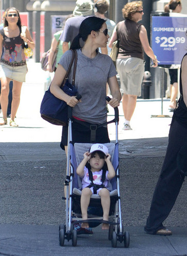 Lucy Liu Strolls Through NYC with a Young Family Member [June 30]