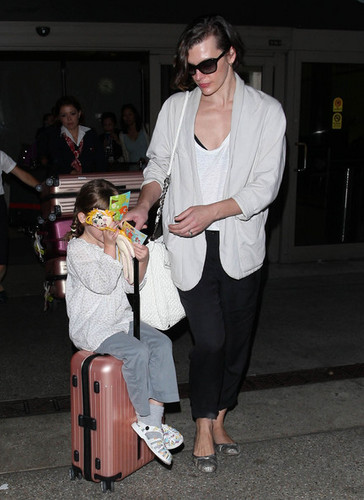 Milla Jovovich And Ever Land In LA [July 10, 2012]