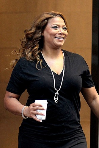 Queen Latifah is spotted leaving her hotel in New York City carrying a coffee [July 11, 2012]