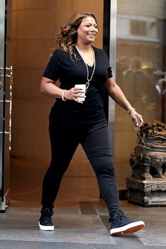 Queen Latifah is spotted leaving her hotel in New York City carrying a coffee [July 11, 2012]