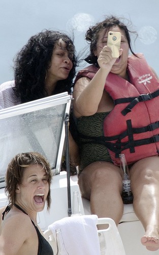  Rihanna out tubing and drinking with دوستوں in Barbados