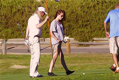  Kristen playing golf with her dad in Malibu