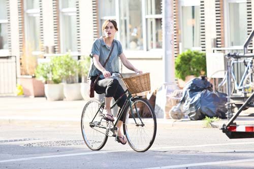  Keira riding a bicycle during a scene for "Can a Song Save Your Life?" in Brooklyn (July 25)