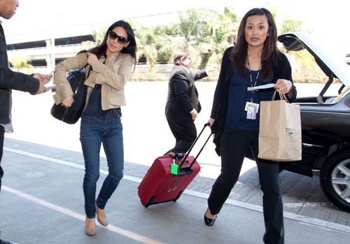 Lucy Liu Takes Off [July 30, 2012]