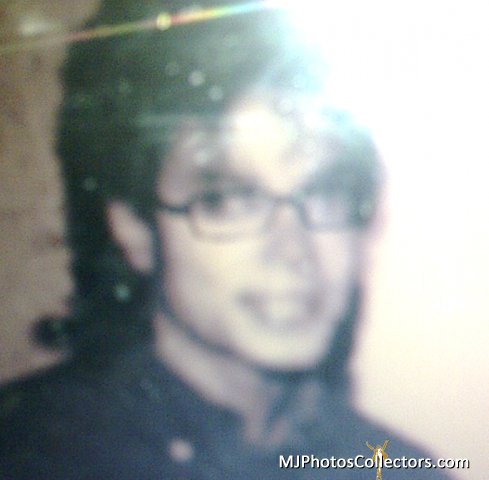 MJ wearing glasses