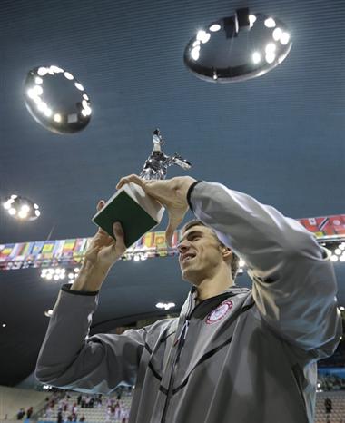  Phelps make history at ロンドン games.