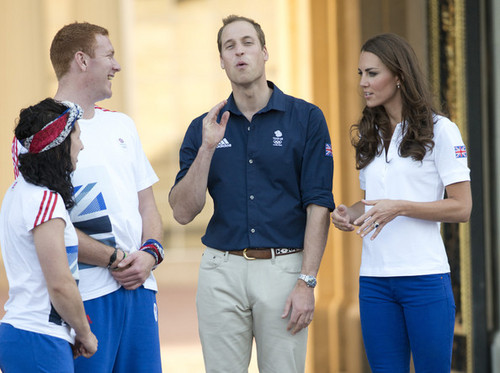  Will, Kate and Harry receive the Olympic Torch