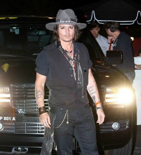 Johnny Depp arrives at Pink Taco