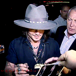  Johnny signs autographs