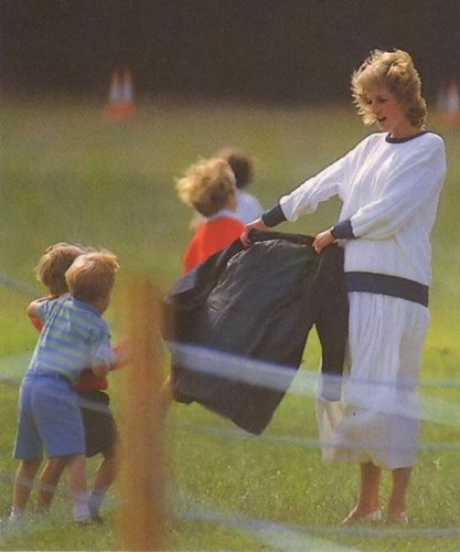  Princess Diana playing with Prince Harry