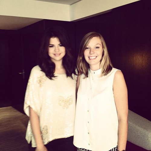  Selena Gomez with a پرستار at Paris. 3rd September 2012